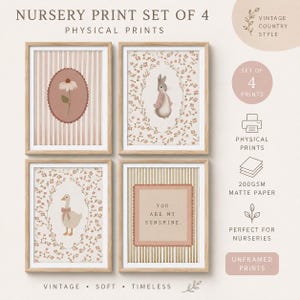 May include: A set of four physical nursery prints in light wood frames. The prints feature a flower in a scalloped oval, a rabbit in a floral wreath, a goose in a floral wreath, and the text YOU ARE MY SUNSHINE in a scalloped square frame.