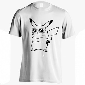May include: White t-shirt featuring a black and white graphic of a cartoon character wearing sunglasses. The character has large ears and a lightning bolt tail. The design is centered on the front of the shirt.