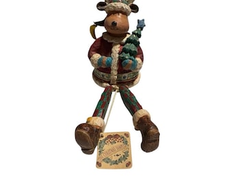 Figura navideña de reno de Russ Berrie con estante para árbol
