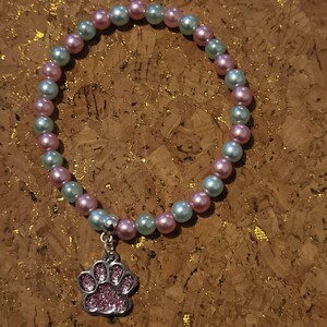 La colección de huellas de patas "Roxy & Patches"