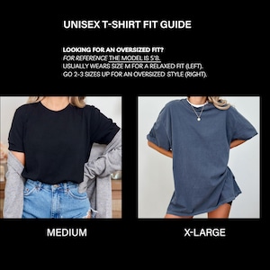 May include: A black t-shirt and a blue-grey t-shirt are shown in this image. The text "UNISEX T-SHIRT FIT GUIDE" is at the top. The text below says "LOOKING FOR AN OVERSIZED FIT? FOR REFERENCE THE MODEL IS 5'8. USUALLY WEARS SIZE M FOR A RELAXED FIT (LEFT). GO 2-3 SIZES UP FOR AN OVERSIZED STYLE (RIGHT)."