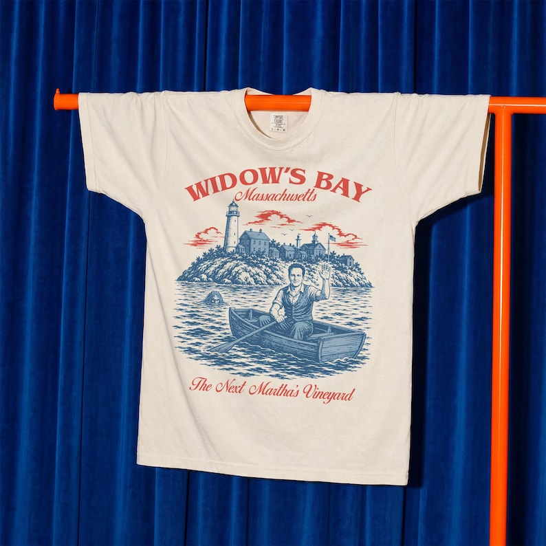 Widow's Bay TV Show t-shirt with vintage travel poster art and sea hag on a unisex comfort colors graphic tee