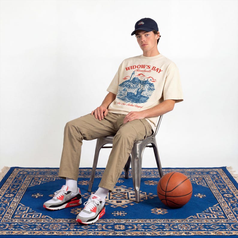Widow's Bay TV Show t-shirt with vintage travel poster art and sea hag on a unisex comfort colors graphic tee