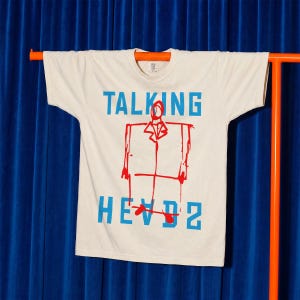Talking Heads band t-shirt, retro David Byrne oversized suit sketch art graphic tee shirt for 80s rock band album fans, Talking Heads once in a lifetime memorabilia apparel