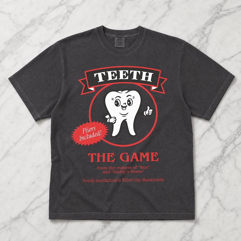 Funny Widow's Bay tv show t-shirt with Teeth board game graphic on a unisex washed black comfort colors graphic tee