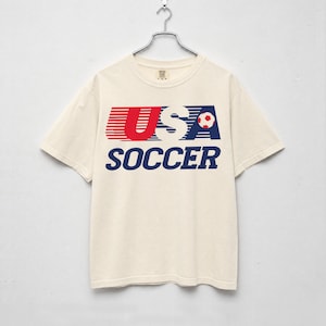 Camiseta com estampa da Seleção Americana de Futebol, estilo anos 80, para fãs dos Estados Unidos.
