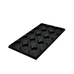 May include: A black rectangular silicone mold with a repeating pattern of star-shaped cavities. The mold is designed for creating shaped treats or crafts. The surface is matte and the edges are clean.