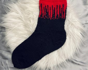 Modèle de tricot de chaussettes cramoisies