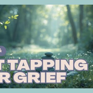 May include: A serene image of a forest scene with the text "HEALING EFT TAPPING FOR GRIEF." A stack of stones sits in the foreground, with sunlight filtering through the trees in the background. The overall color palette is soft greens and blues.