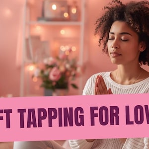 May include: A woman with closed eyes and hands in prayer position, with the text "EFT TAPPING FOR LOVE" on a pink banner. The background is a pink room with flowers and soft lighting, suggesting a wellness theme.