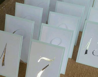 TABLE NUMBERS, Table number tent cards, white with silver foil