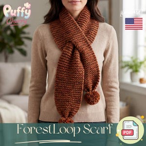May include: A rust-colored Forest Loop Scarf is draped around a person's neck. The scarf is knit with a textured stitch and has a pom-pom at each end. The words "Forest Loop Scarf" are displayed at the bottom of the image.