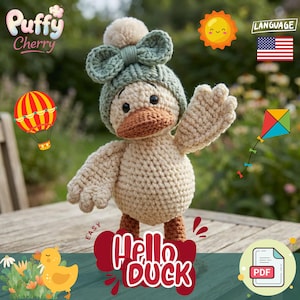 May include: A crocheted duck doll with a green hat and bow, brown beak, and beige body. The doll is holding up one wing. The text "Hello Duck" is displayed in red. A hot air balloon, sun, kite, and the words "Puffy Cherry" are also visible.