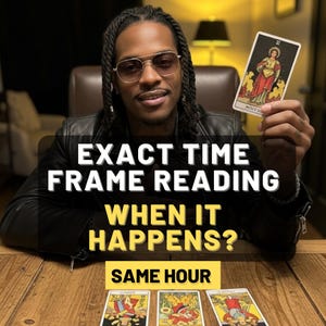 May include: A person holding a tarot card with the text "EXACT TIME FRAME READING WHEN IT HAPPENS? SAME HOUR". The person is wearing glasses and a black jacket. Three tarot cards are on the wooden table.