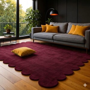 handmade tufted rug, burgundy rug, scalloped edge rug, modern area rug, plush carpet, luxury rug, living room rug, statement rug, custom tufted rug, aesthetic decor rug, contemporary rug, soft floor rug, unique shape rug