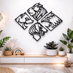 May include: Black metal wall art featuring four animal profiles: a lion, bear, eagle, and horse. The artwork is mounted on a white wall, surrounded by potted plants and decorative items, creating a modern, nature-inspired aesthetic.