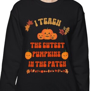Adorable Fall Teacher Sweatshirt, I Teach The Cutest Pumpkins In The Patch Shirt, Cute Autumn Lover Apparel, Playful Teacher Halloween Top.