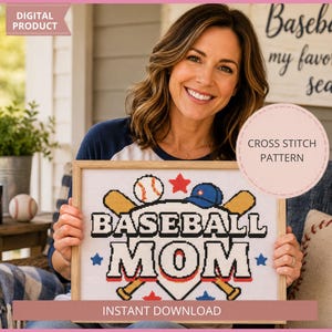 May include: A digital cross stitch pattern featuring the text BASEBALL MOM in black block letters. The design includes a white home plate, two crossed wooden bats, a baseball, a blue cap, and red and blue stars on a white background.