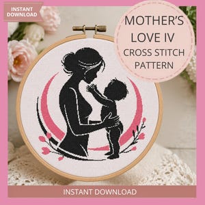 May include: A cross-stitch pattern in a wooden hoop features a black silhouette of a mother and child. The design includes pink crescent shapes and floral accents. The text "MOTHER'S LOVE IV CROSS STITCH PATTERN" is displayed on the top right. "INSTANT DOWNLOAD" is written at the top left and bottom.