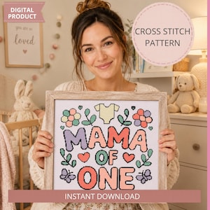 May include: A framed cross-stitch pattern with the text "MAMA OF ONE" in colourful letters, surrounded by floral and butterfly designs. The words "DIGITAL PRODUCT" and "INSTANT DOWNLOAD" are also visible.