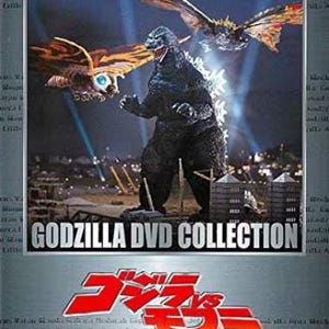 May include: A Godzilla DVD collection case featuring the film Godzilla vs. Mothra. The cover art displays a dark, textured Godzilla standing in a city landscape with two large, winged Mothra creatures flying above. The text reads Godzilla DVD Collection.