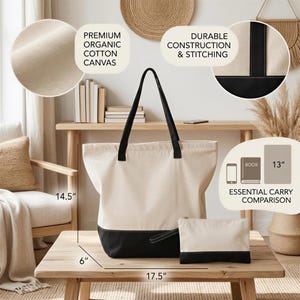 a large tote bag with a black and white color scheme, placed on a wooden table. The bag has a spacious interior and a sturdy handle. The bag is accompanied by a smaller bag, likely a makeup bag, and a book. The image also includes text that provides information about the bag, such as its premium organic cotton canvas material, durable construction, and stitched details.
