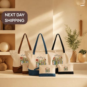 a collection of tote bags and small bags with floral designs, arranged on a shelf against a beige wall.