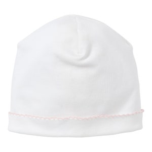 May include: White baby hat with a pink stitched trim around the edge.