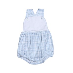 May include: A blue and white plaid baby romper with straps and a ruffled bottom.