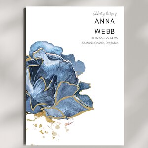 May include: A memorial card featuring a blue and gold watercolor floral design. The text reads "Celebrating the Life of ANNA WEBB 10.09.53 - 29.04.25 St Marks Church, Droylsden."