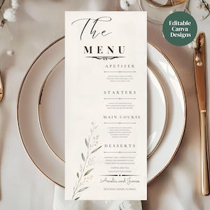 May include: A vertical cream-colored menu card featuring black serif and script typography, titled The Menu, with sections for Appetizer, Starters, Main Course, and Desserts, decorated with a delicate green botanical illustration on the left side.