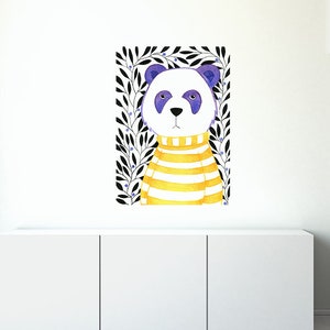 May include: A watercolour illustration of a panda bear wearing a yellow and white striped jumper. The panda is surrounded by black branches with small blue berries.