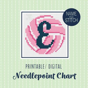 May include: A digital needlepoint chart featuring a pink and navy blue letter "E" design. The design is surrounded by a pink floral pattern and set against a white background. The text "Name that Stitch" is in a navy blue circle. The words "Printable/Digital Needlepoint Chart" are also included.