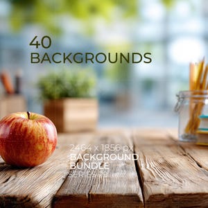 May include: A digital image file featuring a red and yellow apple on a rustic wooden surface with text that reads 40 BACKGROUNDS 2464 x 1856 px BACKGROUND BUNDLE SERIES 29, with a blurred background showing a plant and pencils.
