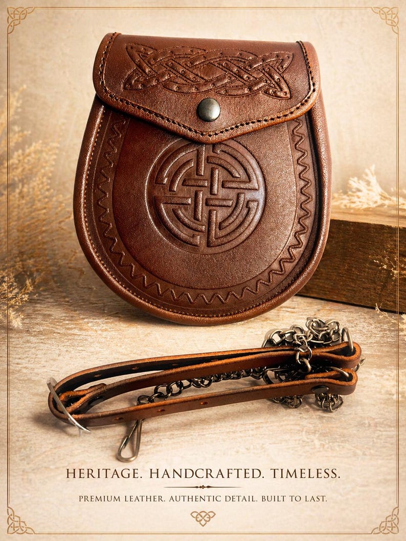 May include: A brown leather sporran with Celtic knotwork detailing and a decorative flap. The sporran features a central embossed design and a chain and leather strap. The text reads: HERITAGE. HANDCRAFTED. TIMELESS.