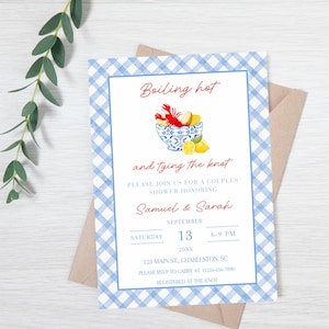 May include: A rectangular invitation card with a blue and white gingham border. The centre features a blue and white bowl with a red lobster and yellow lemons. Text reads: Boiling hot and tying the knot, Samuel & Sarah, September 13, 20XX.