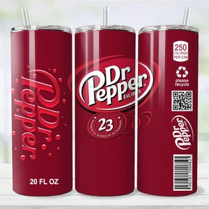May include: A red insulated tumbler featuring the Dr Pepper logo and branding. The tumbler has a silver lid and straw. The design includes the text "20 FL OZ", "250 Calories Per Can", and a recycling symbol. The tumbler is designed to resemble a Dr Pepper can.