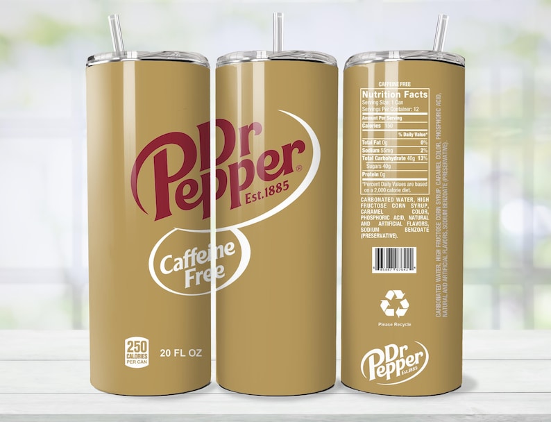 May include: A gold-colored 20 fl oz tumbler featuring the Dr Pepper logo in red and white. The tumbler includes the text "Caffeine Free" and nutritional information. It has a silver lid and a clear straw.