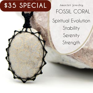 May include: Oval fossil coral pendant necklace with a black woven cord. The pendant is cream-colored with a detailed floral pattern. The necklace is displayed against a light-colored stone. Text on the image reads "Fossil Coral".