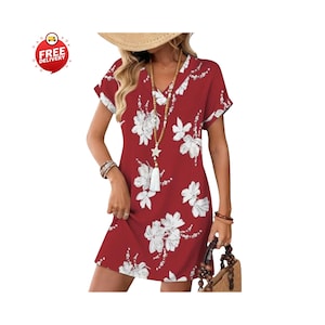 Woman wearing casual summer t-shirt dress with pockets, Relaxed fit short sleeve v-neck mini dress outfit, Beach vacation outfit with flowy t-shirt dress, Women’s casual pocket dress styled with sandals, Summer t-shirt dress paired with straw hat and bag, Short sleeve mini dress for spring outings, Casual wedding guest t-shirt dress for women, Comfortable maternity-friendly flowy dress design, Teacher outfit featuring relaxed summer dress, Plus size casual t-shirt dress with pockets