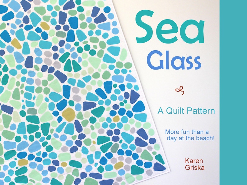 May include: A quilt pattern titled "Sea Glass" with a colorful mosaic design in shades of blue, green, and yellow. The text "A Quilt Pattern" and "More fun than a day at the beach!" are also included.