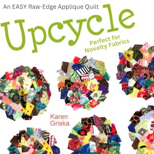 Peut inclure: Une couverture de livre avec le titre "An EASY Raw-Edge Applique Quilt" et le grand mot "Upcycle" en vert. La couverture présente des motifs de courtepointes circulaires colorés faits à partir de divers morceaux de tissu. Le texte "Perfect for Novelty Fabrics" est également présent.