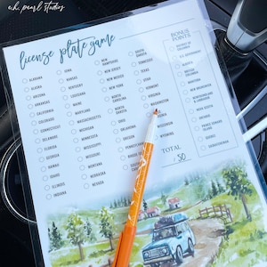 May include: A printable license plate game with a list of states and provinces to check off. The game includes a bonus points section for states and provinces outside of the US. The game is illustrated with a watercolor painting of a car driving through a rural landscape.