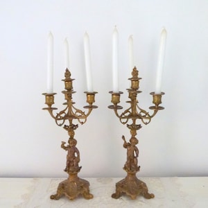 Pair Antique French spelter candle stick holders candelabras candle holders girandole candelabras w putti cherub figures Chateau decor