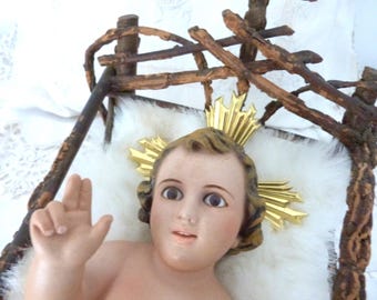 Antique religious statue infant child baby Jesus Christ nativity christmas handpainted figure w glass eyes and halo w twig crib for church