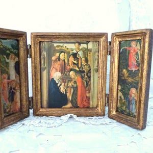 Antique triptych madonna w child Jesus nativity scene, adoration of Magi, archangel, travel icon gilded wooden devotional religious triptych