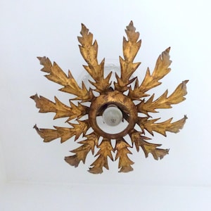 Star burst antique French tole metal sunburst starburst lighting gilded sun burst chandelier hanging ceiling light lamp sconce chic design