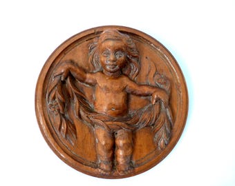 Panel de madera antiguo con relieve de niño o querubín putti, medallón para colgar en la pared, decoración arquitectónica francesa tallada, arte arquitectónico recuperado