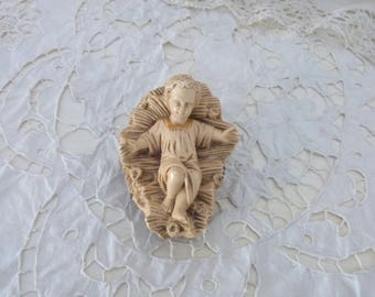 Antique French religious statue infant child baby Jesus Christ in crib nativity christmas holiday decoration stocking gift for under the tre