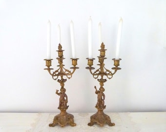 Pair Antique French spelter candle stick holders candelabras candle holders girandole candelabras w putti cherub figures Chateau decor